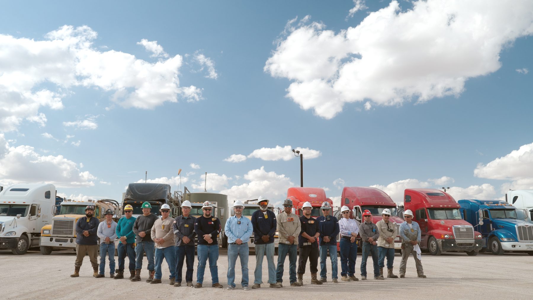 Moonshine Energy crew in front of the fleet